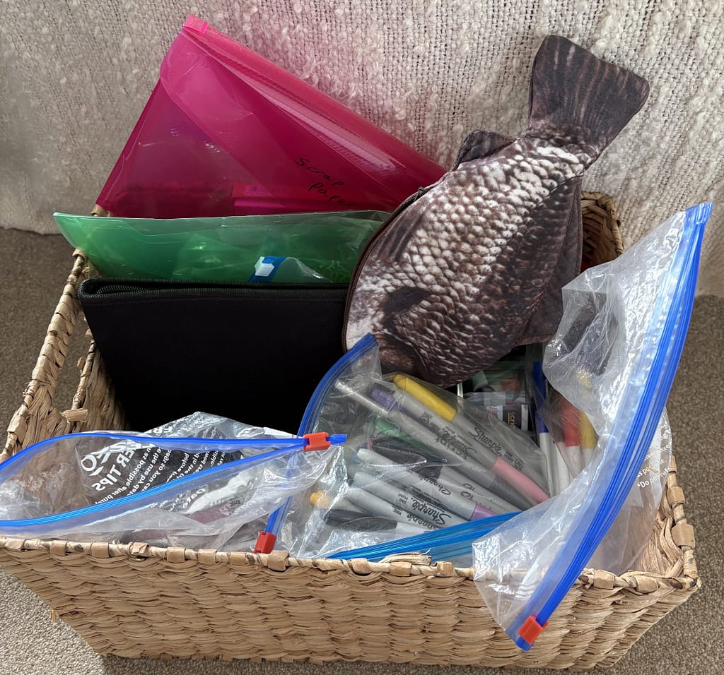 organised art supplies in containers and bags for easy low demand creative access