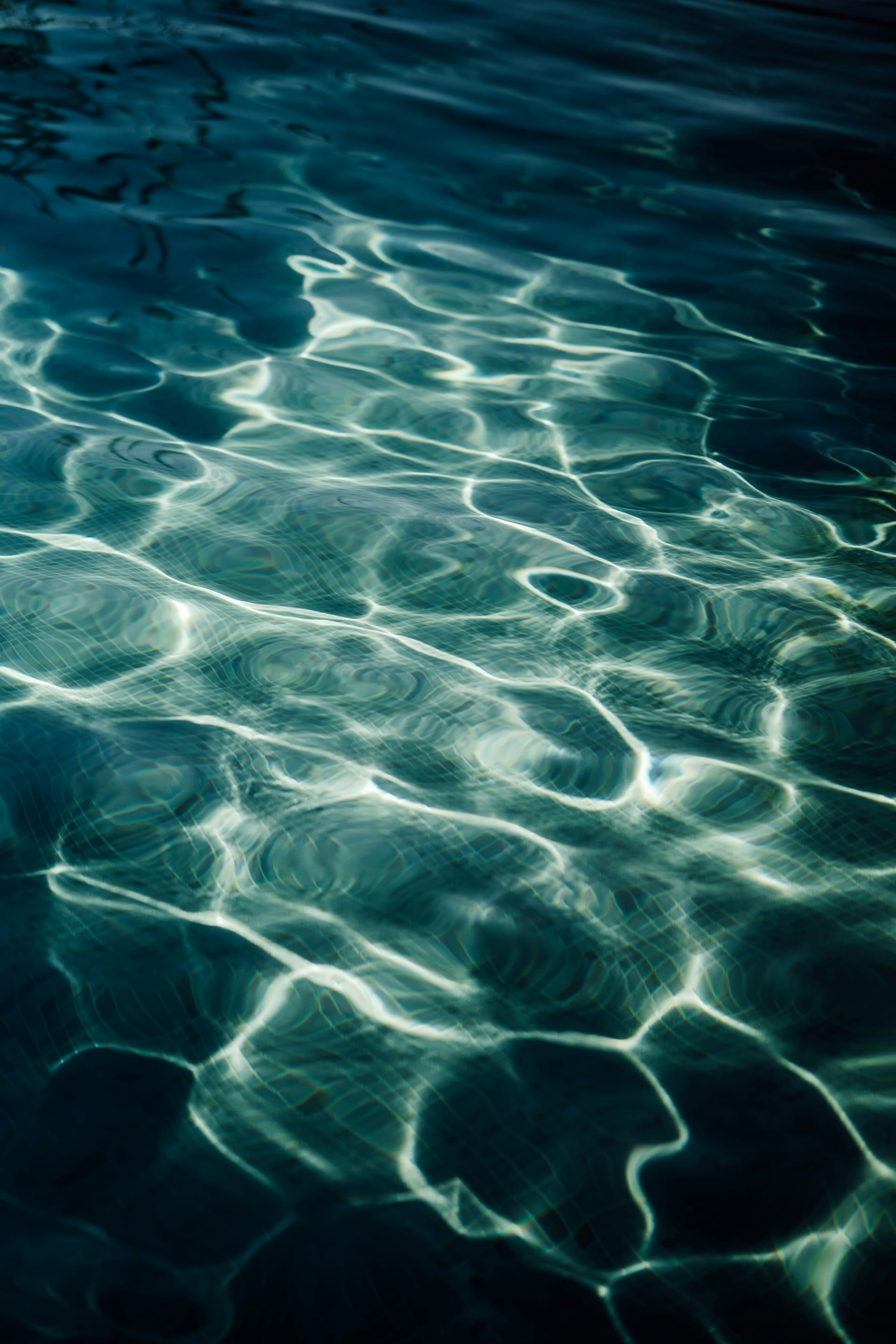 Sunlight reflecting on pool water, representing my Nirvana Spa review and sensory-friendly spa experience.